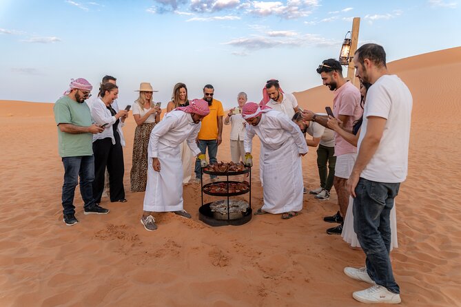 Desert Camp Experience in Riyadh - Sandboarding across the dunes
