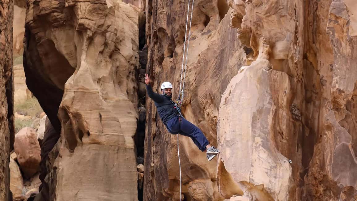 Private Abseiling in Alula Desert. - Reaching the summit and preparing for the rope