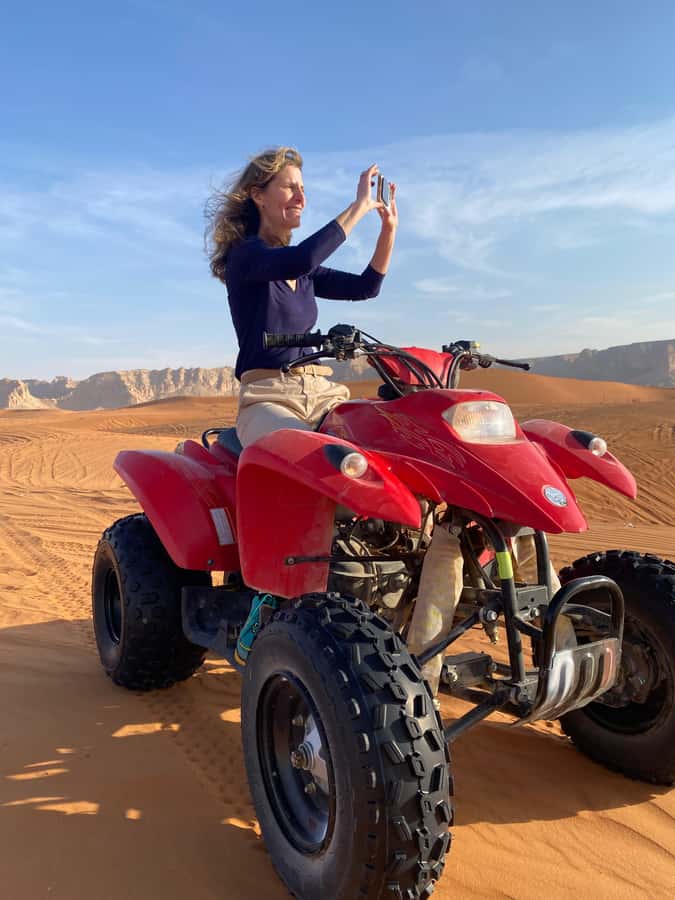 VIP Red Dunes: Camel, Quads, Private Tour & Coffee - Sunset, photos, and the changing desert light