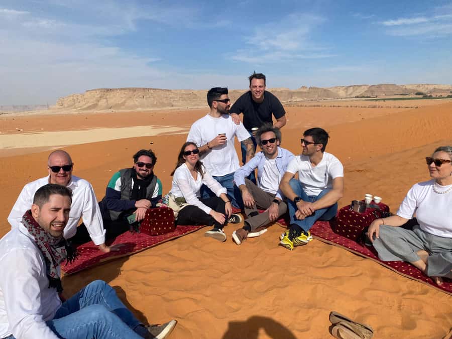 VIP Red Dunes: Camel, Quads, Private Tour & Coffee - Dune bashing across red and golden sand